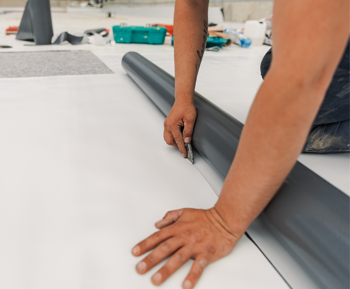 Installing vinyl flooring in progress