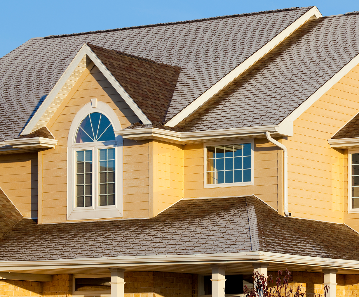 Two-story house with large windows